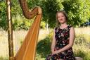 Alis Huws with the Royal Harp.