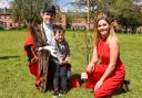 The Mayor, Mayoress and Mini Mayor, Cllr Jay Moore, Poppy King and their son, Alfie,  with the newly planted oak tree