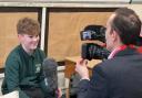 Daniel Salisbury-Jones films a student at Weston Rhyn as part of Futures Week.