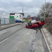 Car crash in Oswestry leads to car overturned