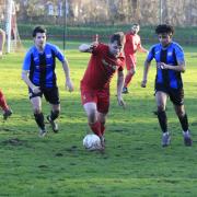 Action from Chirk AAA's defeat to Holywell Town.