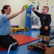 Sarah (Physiotherapist) and Archie in a targeting training session at The Movement Centre