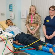 Mr Nilesh Makwana, Consultant Orthopaedic Foot and Ankle Surgeon; Victoria Sugden, League of Friends Charity Director; and Ruth Carle, Pre-Operative Assessment Unit Nurse Practitioner; with the Dopplex ABI machine.