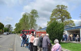 The queues for the pop-up clinic at the  Oswestry Fire Station