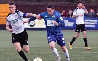 Declan McManus in action for TNS against Bala Town. Picture by Brian Jones.