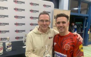 Harry Cain with his man of the match award being presented by Chris Toller of Henstone Distillery.