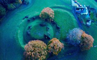 An aerial view of the motte and bailey castle earthworks at Sycharth - the ancestral home of Owain Glyndwr last native Prince of Wales. By Llywelyn 2000 usable under creative commons licence.