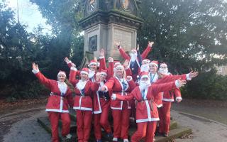 Oswestry lawyer gathers colleagues to join her in lunch break Santa Run.