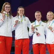 England's Freya Anderson, Anna Hopkin, Isabella Hindley and Abbie Wood celebrate silver in the Women's 4 x 100m Freestyle Relay - Final at Sandwell Aquatics Centre on day two of the 2022 Commonwealth Games in Birmingham. Picture date: Saturday