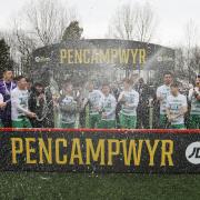 TNS players and management celebrate a 16th JD Cymru Premier title.