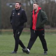 Chirk AAA manager Gary Jones (right) has departed Holyhead Road.