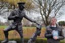 Dave Andrews, author of Each Slow Dusk, next to the Wilfred Owen statue in Cae Glas Park, Oswestry