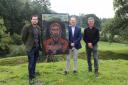 Artist Dan Llywelyn Hall, Montgomeryshire MS Russell George and Powys County Councillor Aled Davies at the unveiling of the painting of Owain Glyndwr at the site of Sycharth. Issue date: Saturday September 16, 2023.