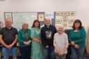 From left to right: Mike King, Pam Willing, Karen Ethelston, Ken Owen, Anne Harrison, Su Davies , members of the Oswestry Family and Local History Group and the Oswestry Borderland Heritage.