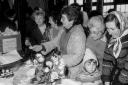 Ladies enjoying a rummage at a jumble sale in Gobowen, 1983.