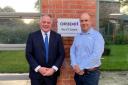From left to right:  Simon Baynes MP with Managing Director, James Earl, outside OR3D’s office in Chirk