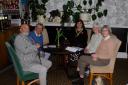 Sgt Muston's family with Oswestry family history group members Kenton Owen and Karen Ethelston.