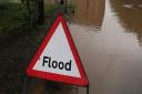 Oswestry main road flooded causing traffic build-up