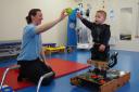 Sarah (Physiotherapist) and Archie in a targeting training session at The Movement Centre