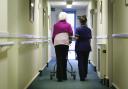 Generic image of old person with a nurse in a care home. Pic: PA