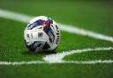 A Mitre Football lies outside of the painted line marking the corner during the Capital One Cup Third Round match at the Emirates Stadium, London. PRESS ASSOCIATION Photo. Picture date: Tuesday September 23, 2014. See PA Story SOCCER Arsenal. Photo