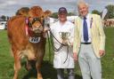 Oswestry Show 2022.
Pictured is Reverend Prebendary David North (Show President) presenting Mick Gould with the Champion Beef Award.
Picture by Phil Blagg Photography.
PB075-2022-102