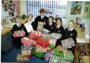 Packing the Christmas parcels for the Kids for Kidz appeal are lr - Sebastian Sharpe, Joe Druce, Amy Brown, Niki Roberts, Phoebe Wright, Hayley Roberts from Lakelands School, Ellesmere.