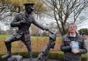 Dave Andrews, author of Each Slow Dusk, next to the Wilfred Owen statue in Cae Glas Park, Oswestry