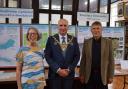From left to right: designer of the ''Evicting A Community 100 Years On'' display, Sylvia Jones, Mayor of Wrexham CBC, Councillor Andy Williams and the Chair of the Ceiriog Memorial Institute, Bryn Hughes