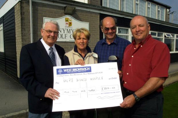 Border Counties Advertizer: A cheque for ?2213 - 07 was presented to Hope House Hospice by Llanymynech Golf Club. The money was mostly raised last year by having a charity bunker, raffles and the Presidents day, pictured lr - Glyn Thomas, fundraiser, Joan Willan, Lady Captain 2002,