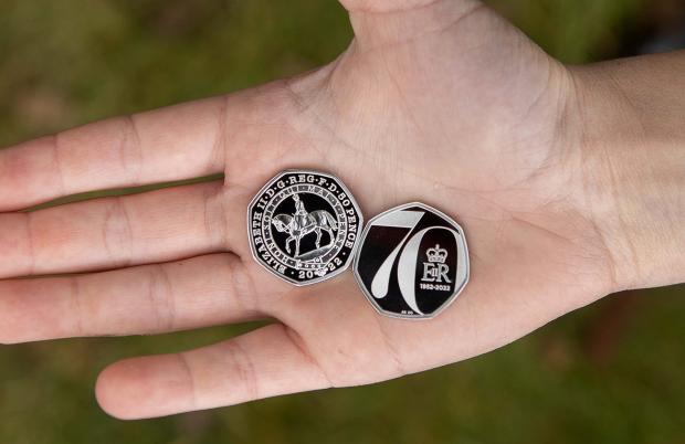 Border Counties Advertizer: The new Platinum Jubilee 50p which will be gifted to 7,000 children completing the QGC Forestry Award. (The Royal Mint) Ltd 