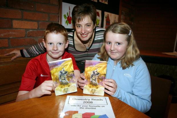 Border Counties Advertizer: Children from Oswestry Youth Cafe are taking part in Oswestry reads 2008 to celebrate the opening of the new library. The book the members are championing is Price Caspian by C.S. Lewis