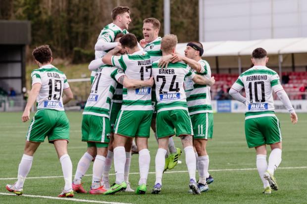 TNS celebrate their draw against Penybont.