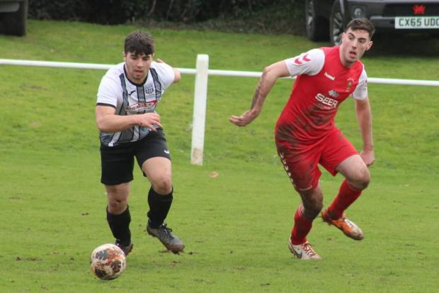 Border Counties Advertizer: Action from Brecon Corries' victory over Llanfyllin Town. Picture by Barcud-Coch Photography.
