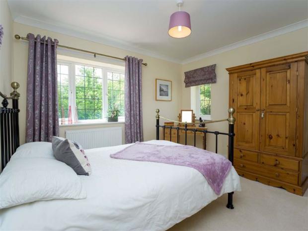 Border Counties Advertizer: One of the bedrooms (image: Halls Holdings Ltd)