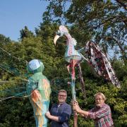 Ian Andrew with giant dragonfly and Tony Lewery with bird