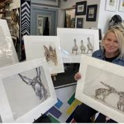 Bev Davies with her work which is being sold at Oswestry Framing in Leg Street.