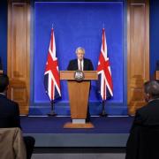 Boris Johnson giving a press conference