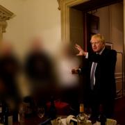 EDITORS NOTE IMAGE REDACTED AT SOURCE Handout photo dated 13/11/20 issued by the Cabinet Office showing Prime Minister Boris Johnson at a gathering in 10 Downing Street for the departure of a special adviser, which has been released with the publication