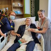 Pictured is Pip Page-Davies, Macmillan Specialist Nurse, with patient Phil Bryers and Shirley Bryers, nee Astbury, during their wedding reception on Montgomery Unit.