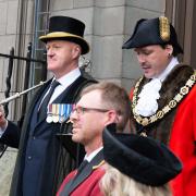 Councillor Jay Moore, the mayor of Oswestry, reads the proclamation of the new King outside the Guildhall. Pic: David Mottram, Camera Club.