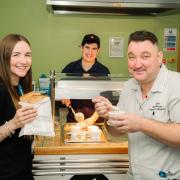 Pictured is Alex Mendez, Catering Assistant; serving Olivia Evans, Improvement Lead; and Karl McGuire, Healthcare Assistant; free toast and porridge at breakfast.