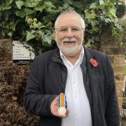 Michael Furmston in Oswestry hold Herbert Furmston's medal