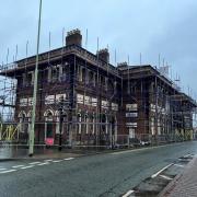 The scaffolding on the Cambrian Heritage Railways building is here to stay.