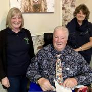 Roger Whitting, centre, was well known for supporting causes around Oswestry.