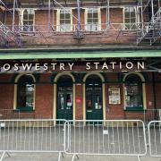 Oswestry station welcomes back its historical sign, after 57 years.