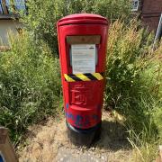 Post-box sealed off due to dog mess hazard
