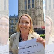Helen Morgan MP with her rural bus petition.