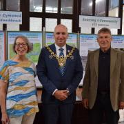 From left to right: designer of the ''Evicting A Community 100 Years On'' display, Sylvia Jones, Mayor of Wrexham CBC, Councillor Andy Williams and the Chair of the Ceiriog Memorial Institute, Bryn Hughes