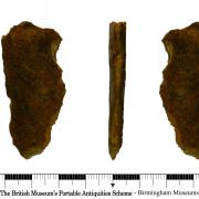 A fragment of a copper alloy blade fragment